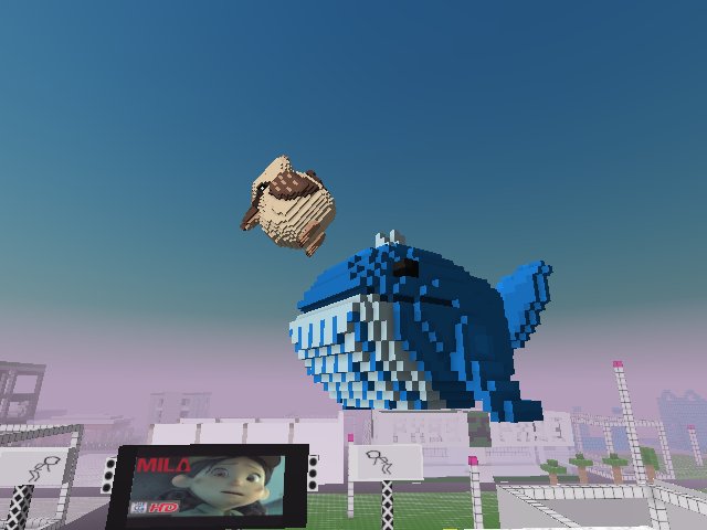 hello #HAppieWhale 🐳🌊#LaughingBird and #Milafilm on big screen at #mavenarte with #momentsq. Come check out the crazing sculptures. 🚧construction going on 😊