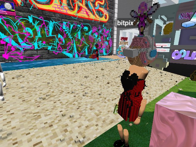 Bitpixi chillin with Voidkross graffiti