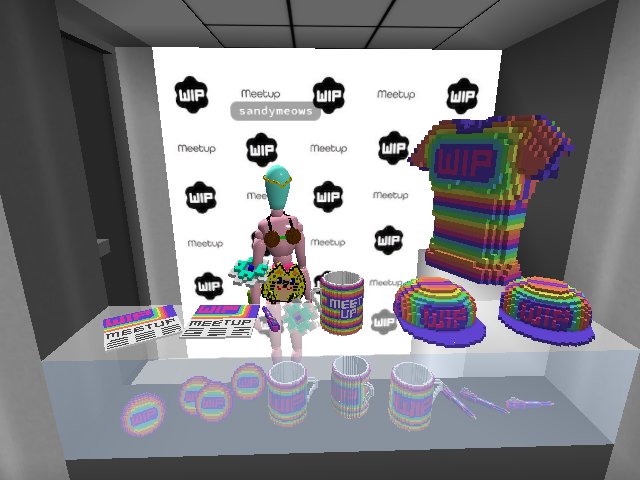 @sandyme0ws doing double duty working at the merch stand at the brand new Metalympics build! #cryptovoxels