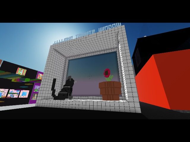 giant jjjjohn tribute window created in 2021 - with more tribute windows by the tezos community displayed in back