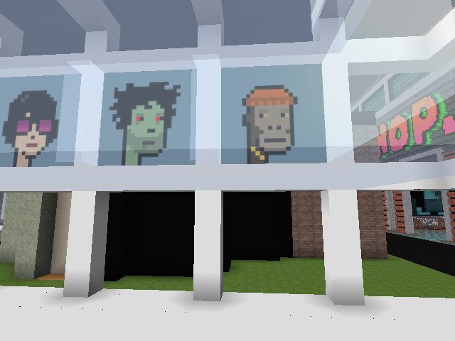 the 3DVoxelPunks voxel sculpture art for the Ape on the right is in https://www.cryptovoxels.com/parcels/3070